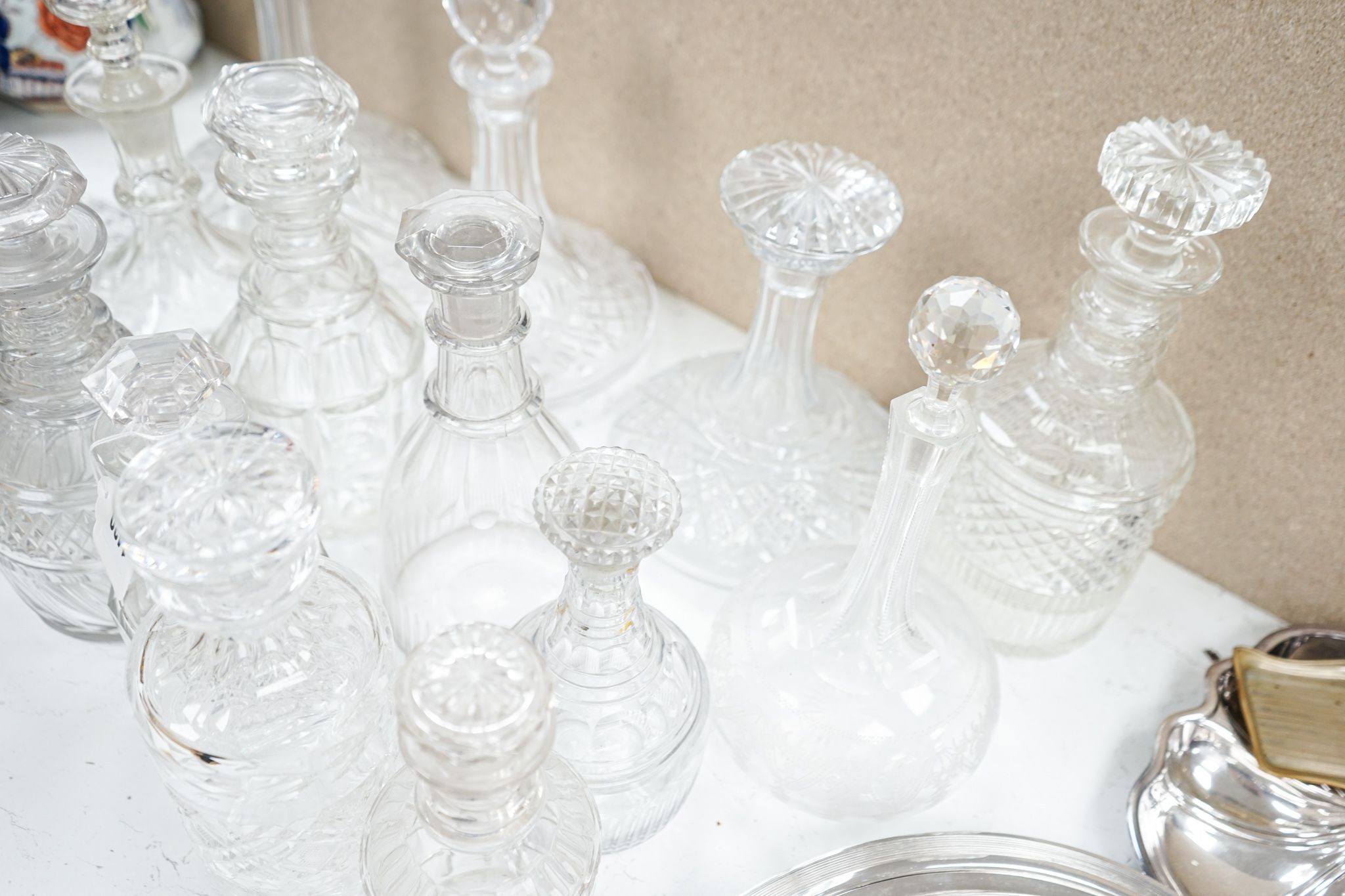 Fourteen various glass decanters 33cm